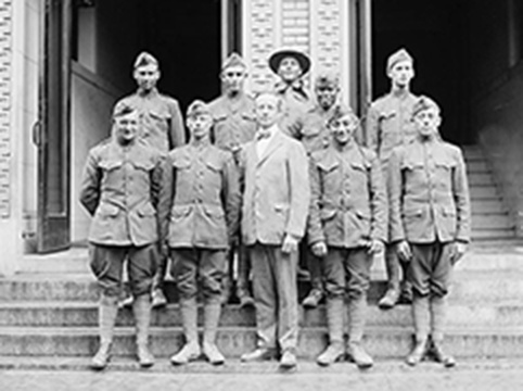 Picture of military unit standing on steps of a building.